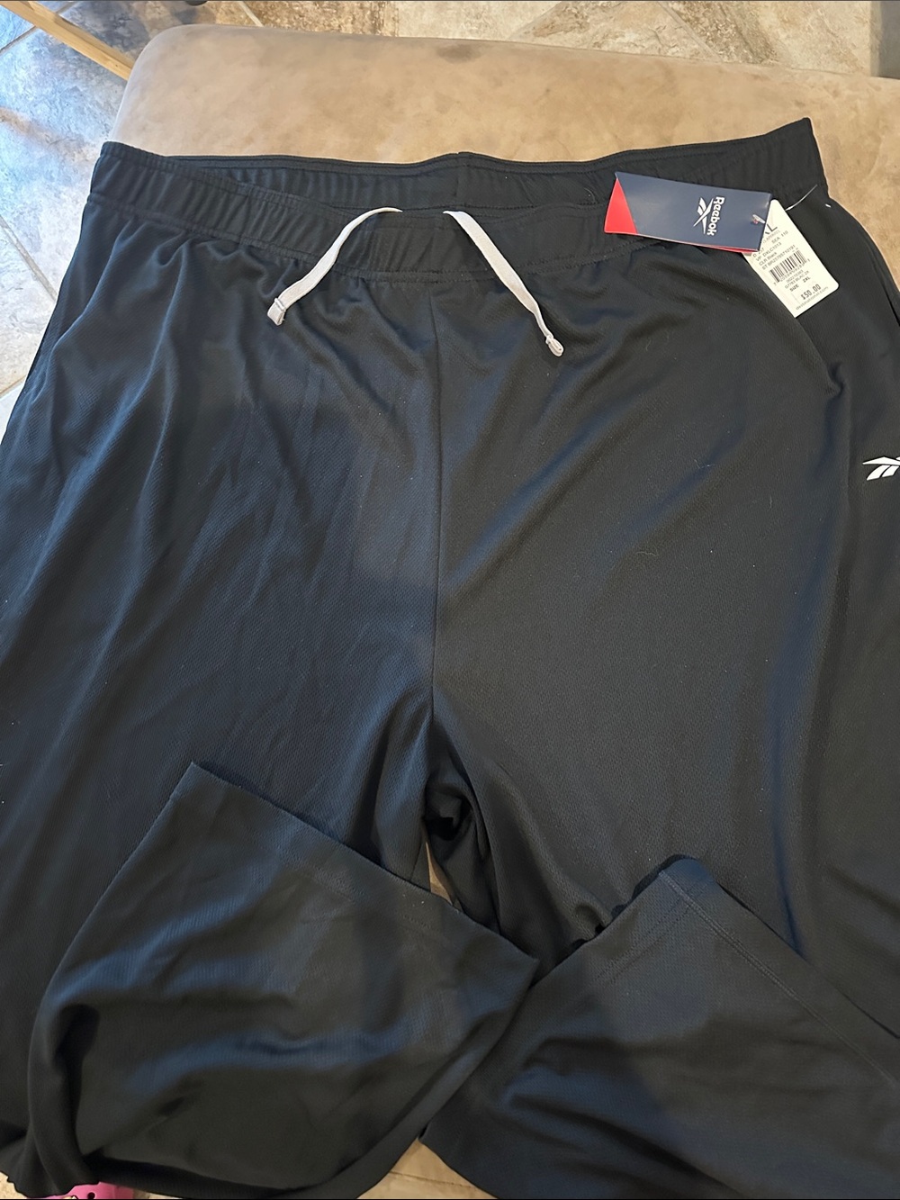 Reebok Men’s Black Jogger Sweatpants with White Drawstring Accent